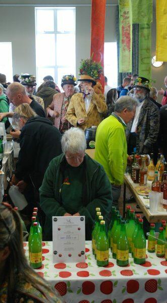A group of people at a cider event