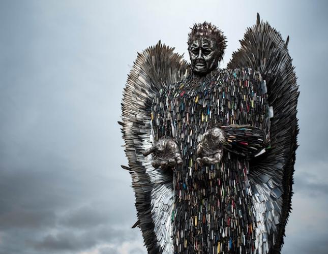 A photograph of Alfie Bradley's 27ft tall sculpture of an angel made with knives