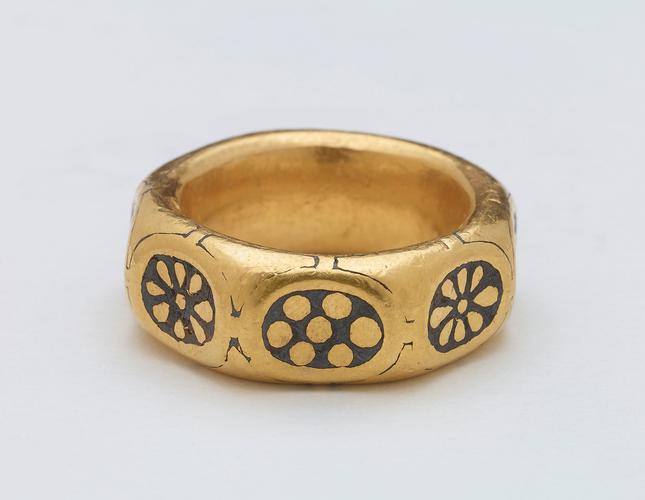 Unique gold ring dated to the 9th century found in the Hoard. It is decorated in the Anglo Saxon 'Trewhidde' style.