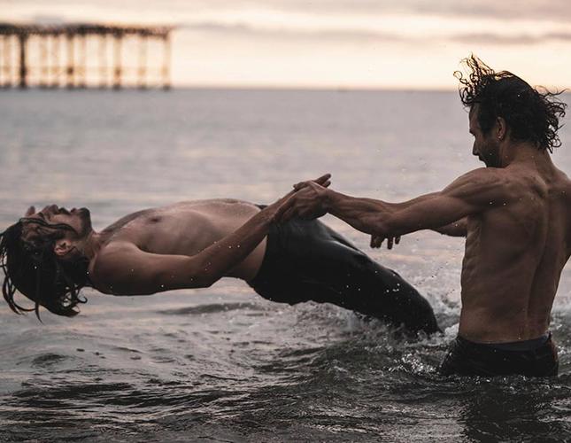 two dancers in water